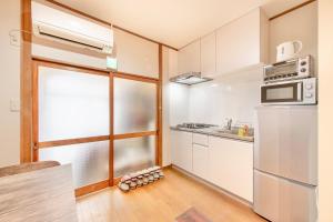 Köök või kööginurk majutusasutuses ぱんだホステル三ノ輪 Panda Hostel Minowa