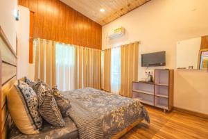 Et tv og/eller underholdning på Amara Woods Villa