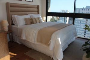 Una cama o camas en una habitación de More deluxe sol