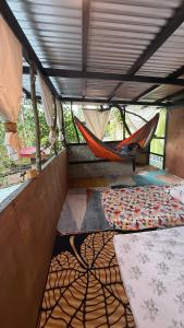 Ένα ή περισσότερα κρεβάτια σε δωμάτιο στο Lola Sayong Duwa Dwelling