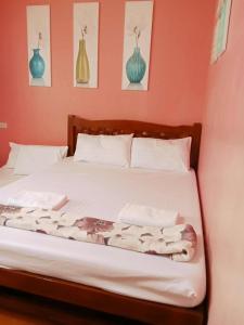 Ένα ή περισσότερα κρεβάτια σε δωμάτιο στο Albergo Cozy condo