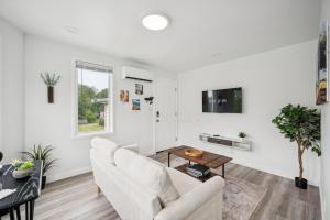 TV a/nebo společenská místnost v ubytování ModPod 3