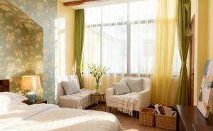 Una cama o camas en una habitación de Dali Garden 48 fotos más