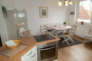 Kuchyň nebo kuchyňský kout v ubytování Whg Dünenblick im Haus Wattenblick