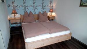 En eller flere senge i et værelse på Wohnung 3 im Haus Wattenblick