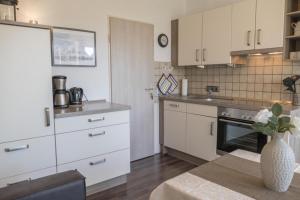 Køkken eller tekøkken på Wohnung 3 im Haus Wattenblick