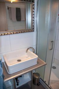 Et badeværelse på Wohnung 3 im Haus Wattenblick