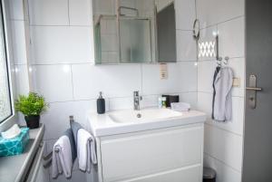 Et badeværelse på Wohnung 4 im Haus Wattenblick