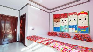 Una cama o camas en una habitación de Jiayi Guesthouse