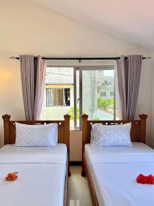 Кровать или кровати в номере North Breeze Nyali Retreat