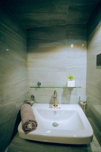 Koupelna v ubytování Kami Unawatuna + 18 fotografií