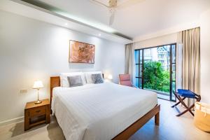 Ένα ή περισσότερα κρεβάτια σε δωμάτιο στο JSD Prime Property-Cherngtalay