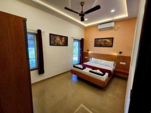 Postel nebo postele na pokoji v ubytování Kunjwan Resort