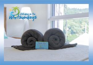 Postel nebo postele na pokoji v ubytování Blue Lagoon Airlie Beach