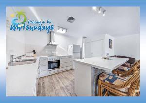 Kuchyň nebo kuchyňský kout v ubytování Blue Lagoon Airlie Beach + 40 fotografií