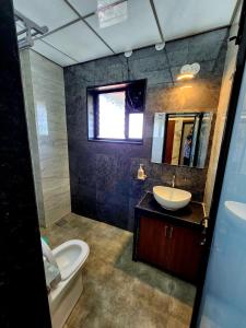 Koupelna v ubytování Kunjwan Resort + 24 fotografií