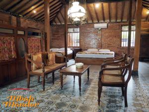 Posezení v ubytování Omah Mbah Mandor Yogyakarta + 13 fotografií