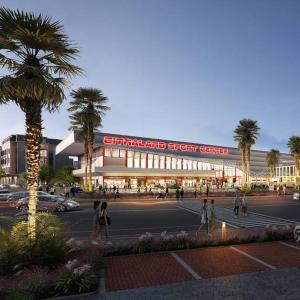 un gruppo di persone che camminano davanti a un edificio di Omah Bubuya Syariah, Surabaya barat 