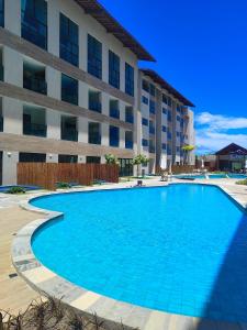 Bazén v ubytování Praia dos Carneiros - Studio Max Carneiros - NOVO nebo v jeho okolí