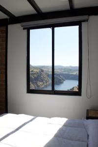 Ένα ή περισσότερα κρεβάτια σε δωμάτιο στο Torres Tzibantzá