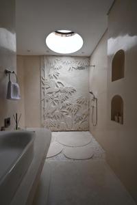 Koupelna v ubytování Meadow Hills Villas by Mahaprana + 22 fotografií