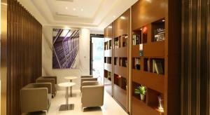 a room with chairs and a table in a building at City Comfort Inn Shenzhen International Exhibition Center Tangwei Metro Station in Fenghuangwei +95 photos