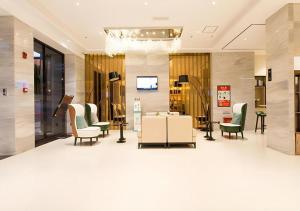 Μια τηλεόραση ή/και κέντρο ψυχαγωγίας στο City Comfort Inn Nanning Taoyuan Road