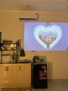 TV/trung tâm giải trí tại Rainbow Homestay