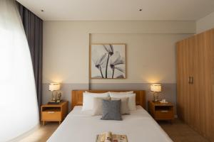 Postel nebo postele na pokoji v ubytování Diamond Island Highfloor RiverView 8min to D1 + 56 fotografií