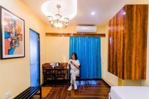 Postel nebo postele na pokoji v ubytování FabHotel Hill Fort