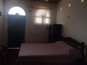 Postel nebo postele na pokoji v ubytování El Garaje Hostal