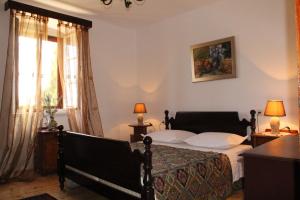 A bed or beds in a room at Villa Roza