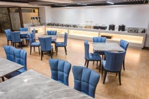 Posezení v ubytování Borrman Hotel Yunfu Xinxing County Bus Station