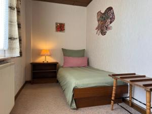 Ένα ή περισσότερα κρεβάτια σε δωμάτιο στο Pension Mountain View Sauerland +23 φωτογραφίες