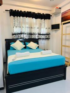 Postel nebo postele na pokoji v ubytování Nisha Grean Heaven + 42 fotografií