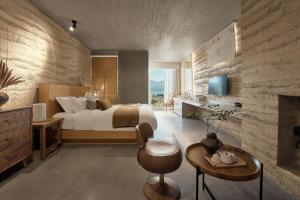 TV a/nebo společenská místnost v ubytování Dali Wuwei Puruohaijing Hotel大理无为普若海景酒店