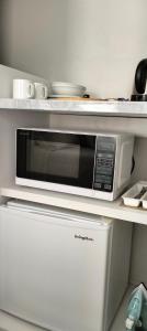 Kuchyň nebo kuchyňský kout v ubytování Mural