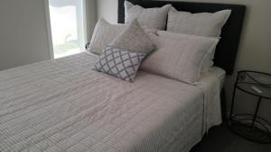 Postel nebo postele na pokoji v ubytování Mural