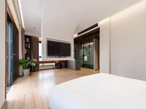 Imagen de la galería de Floral Shemanyue Mountain Homestay, en Tangkou