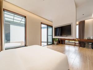 Imagen de la galería de Floral Shemanyue Mountain Homestay, en Tangkou 82 fotos más