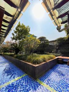 Πισίνα στο ή κοντά στο Gem Flower Jinyu Sunshine Hotel