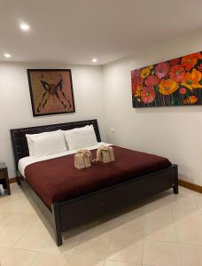 Ένα ή περισσότερα κρεβάτια σε δωμάτιο στο Andaman Hill Pool Seaview