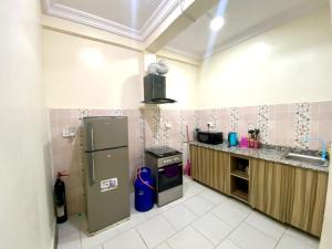 Кухня или мини-кухня в Opal Exquisite Apartment
