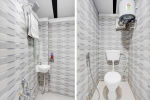 un baño con inodoro y lavabo en Super Hotel O Hanuman Nagar Kankarbagh Formerly Home Town, en Bankipur