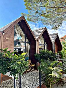 Un jardín fuera de Homestay Cherry Vũng Tàu