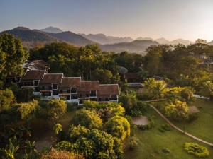 an aerial view of a resort with mountains in the background at La Résidence Phou Vao in Luang Prabang