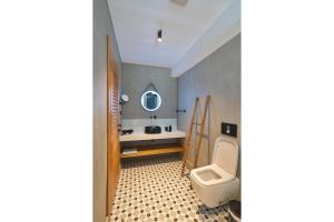 Μια τηλεόραση ή/και κέντρο ψυχαγωγίας στο Carpe Diem Boutique Hotel - Adults Only +61 φωτογραφίες