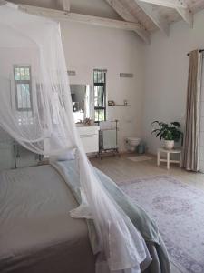 Ένα ή περισσότερα κρεβάτια σε δωμάτιο στο Spacious Family Home +12 φωτογραφίες