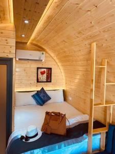 Una cama o camas en una habitación de Homestay Cherry Vũng Tàu