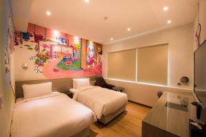 TV a/nebo společenská místnost v ubytování Legend Hotel Kaohsiung Pier2